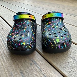 NWT Crocs black with multi stars